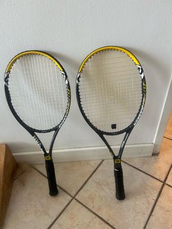 Two Wilson Hyper Carbon Hammer tennis raquets