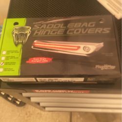 saddle bag hinge covers for 2014 and up harley davidson touring models need 150.00 new in box 