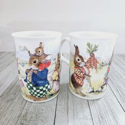 Vintage Set of 2 Bunny Tales by Roy Kirkham Fine Bone China 3"×4" Coffee Mugs Teacups Set. Made in England 1996.

Pre-owned in excellent clean conditi