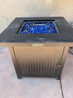Fire pit with propane tank