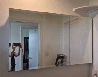 FREE Three-Panel Mirrored Medicine Cabinet