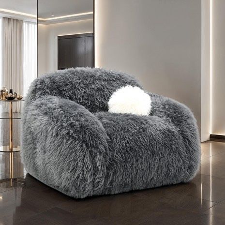 $499 Swivel Shaggy Chair Grey Ball Pillow Included