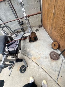 Weights and pulleys bars, bench etc.