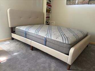 Faux leather queen bed in cream