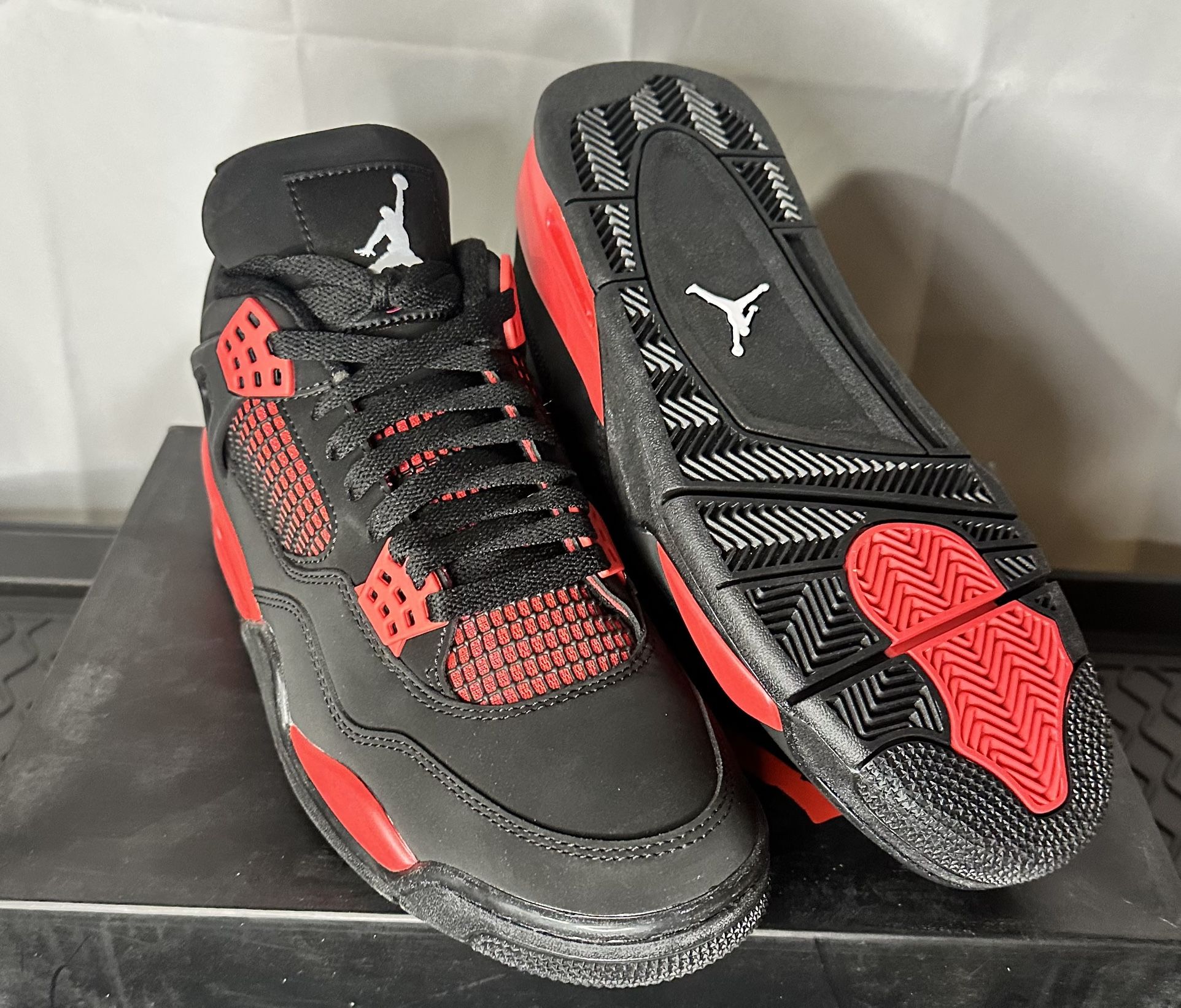Jordan 4 Retro “Red Thunder”