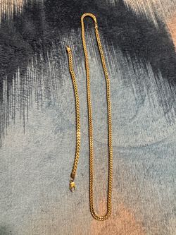 Franco gold 14 k chain 26 in bracket 7.5 in long