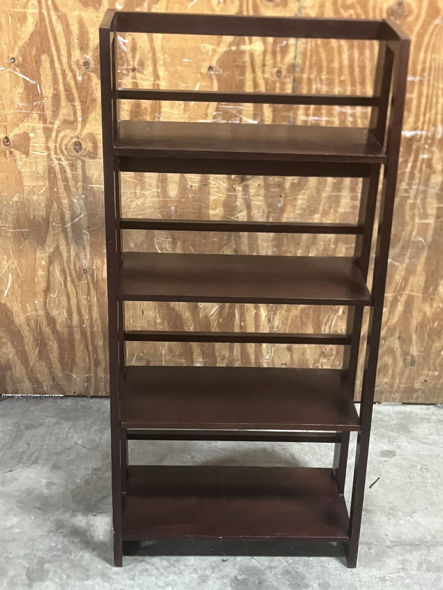 Casual Home 4-Shelf Folding Stackable Bookcase used in good condition.sturdy location below  31705 Wesley Chapel blvd Fl 33543 Storage Mart  