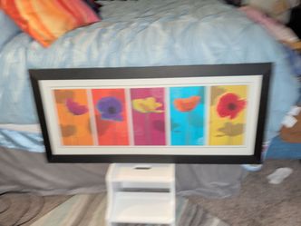 Glass and wooden framed art