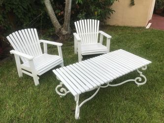 Wooden outdoors chairs and table set.