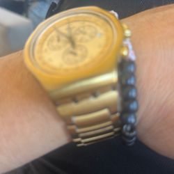 swatch gold chronograph