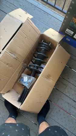 TRQ  front pair struts and coil spring assembly