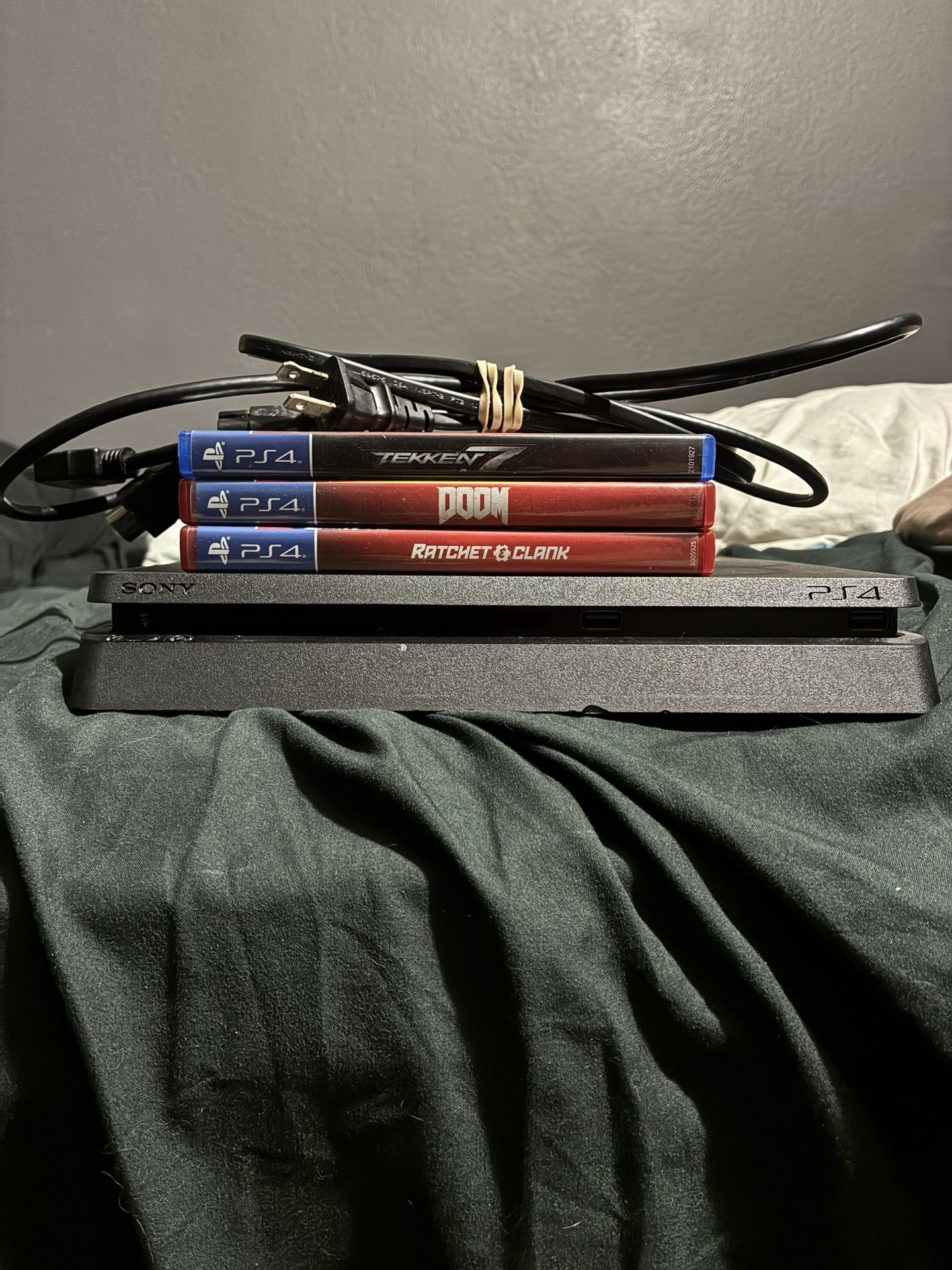 PS4 Slim With Games And Cords Tested Working