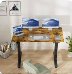 Electric height adjustable desk