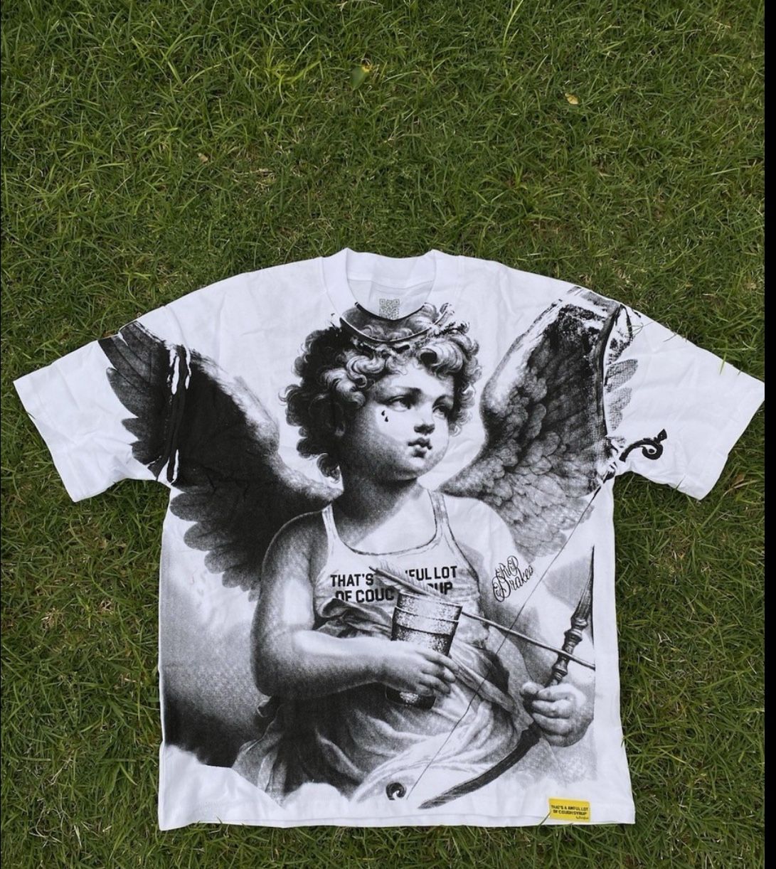 That’s a Awful Lot Of Cough Syrup Cupid Tattoo Design 