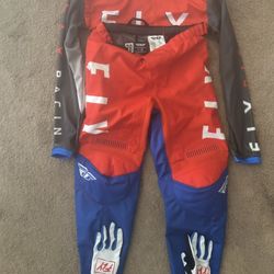 Brand New Motocross Pants, Gloves And Jersey. Size 28 Pants
