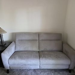 1 Love Seat chair/sofa that reclines with 2 chairs.