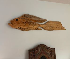 HAND CARVED  from cypress.  hand carved by local artist.  we paid 150