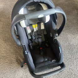 Graco SnugRide SnugFit DLX Infant Car Seat Featuring Safety Surround W/Base