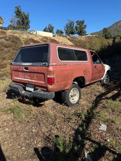 Toyota Pickup Truck with Camper Shell