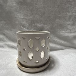 A Small 5 inch ceramic white planter pot with drainage saucer