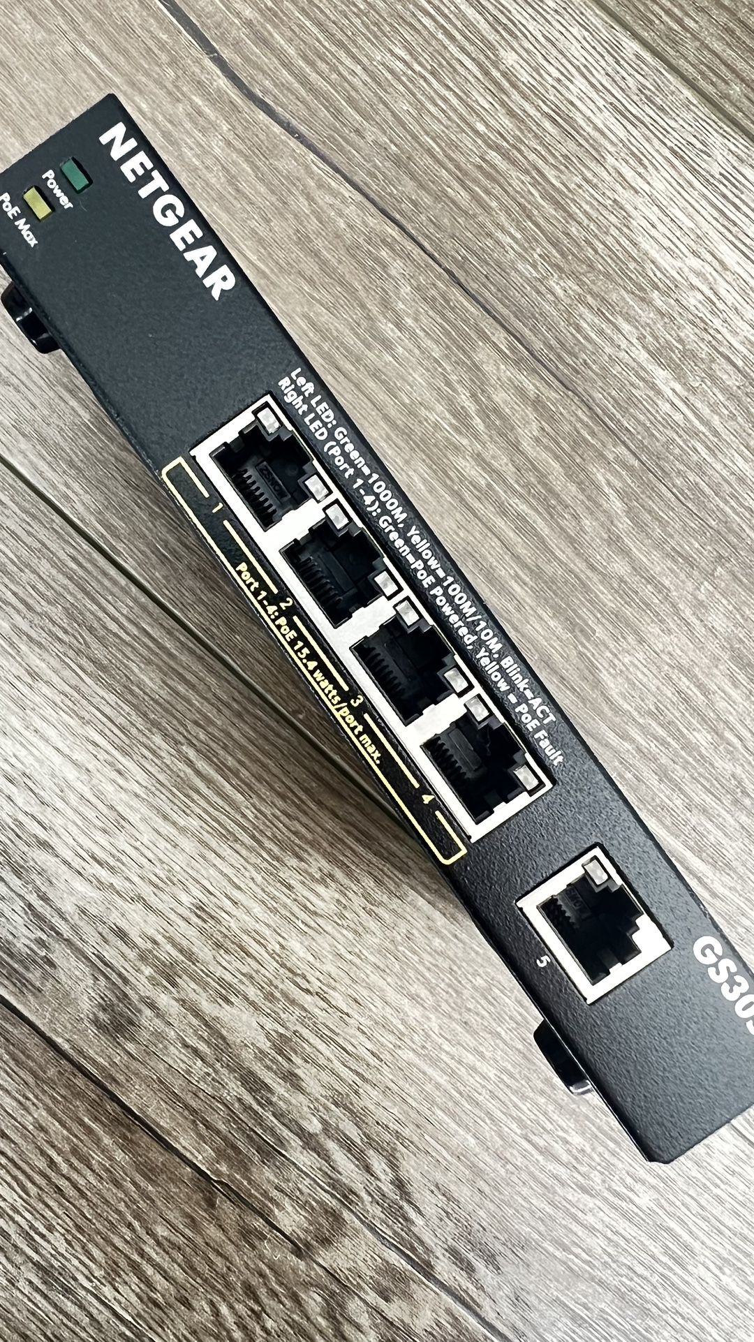 NETGEAR 5-Port PoE Gigabit Ethernet Unmanaged Essentials Switch (GS305P) - with 4 x PoE+ @ 63W, Desktop or Wall Mount