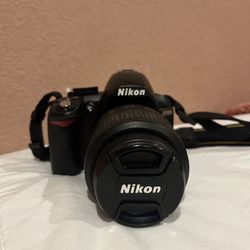 Nikon D3100 w/ AF-S Nikkor DX 18-55mm 1:3.5 - 5.6G (2 new batteries included and charger)