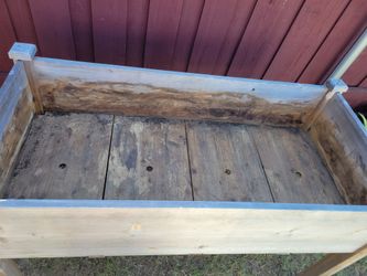 1 raised planter on wheels