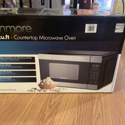 Brand new in box Kenmore microwave