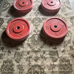 FOUR olympic rubber 45 Pound Weights 