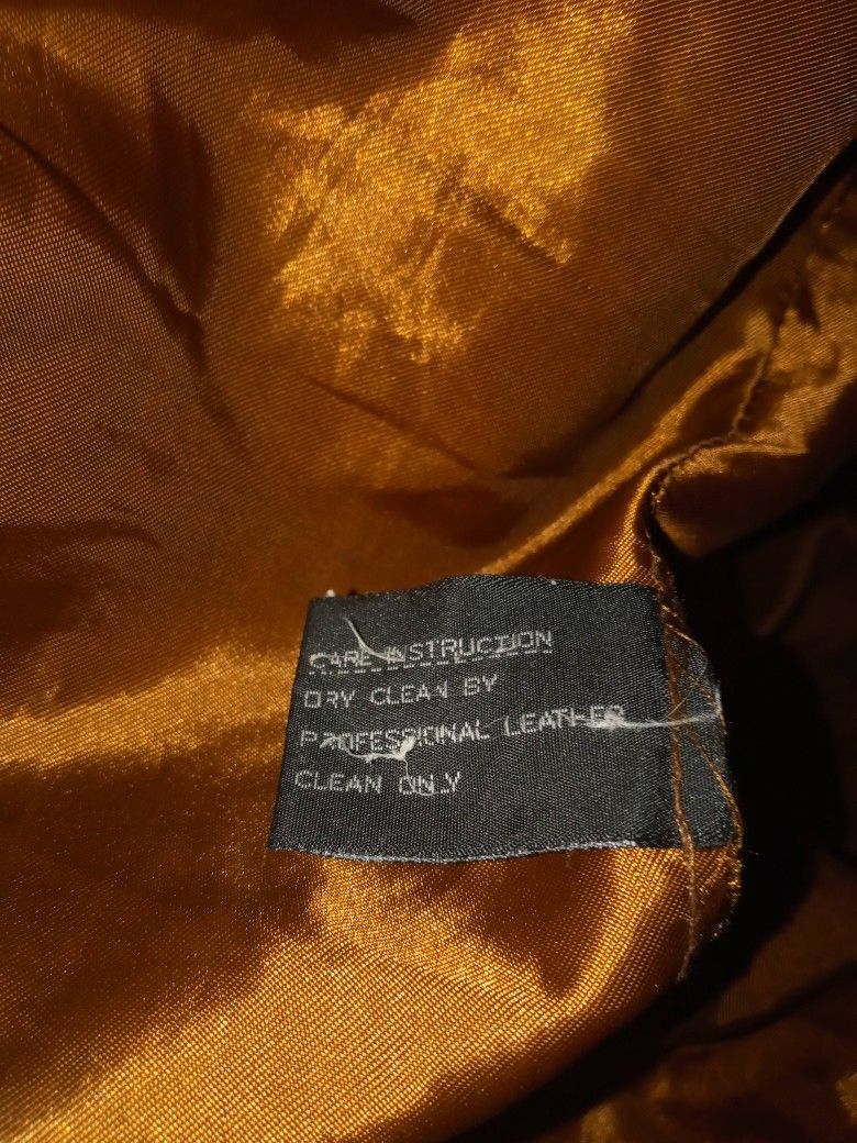 A Fringed Buckskin Coat Size Large 25.oo