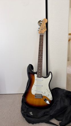Squire Electric Guitar with Amplifier.