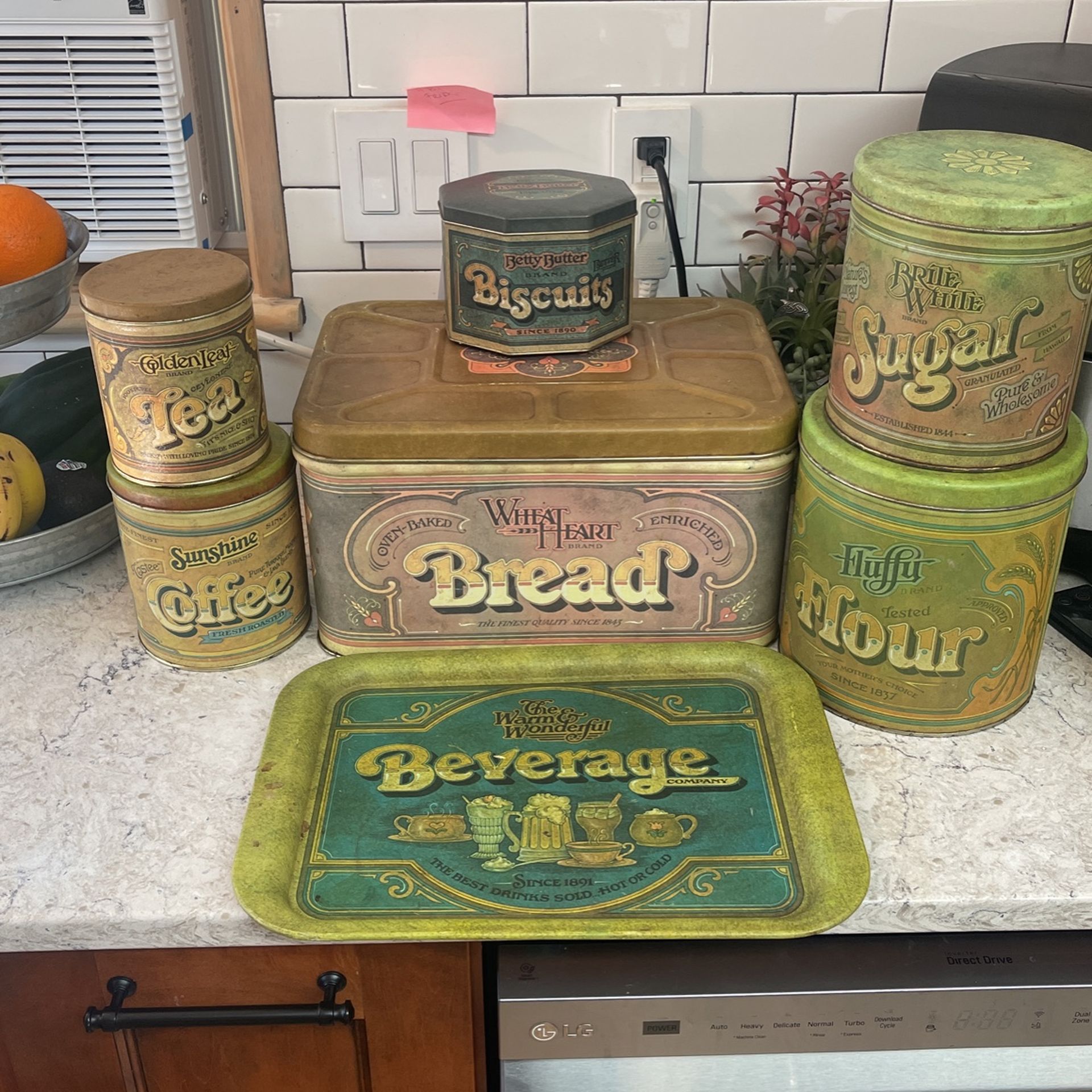 Vintage 7 Piecee Tin Canister Set 