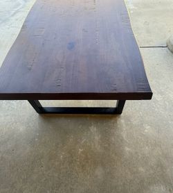 Wood coffee table with live edge