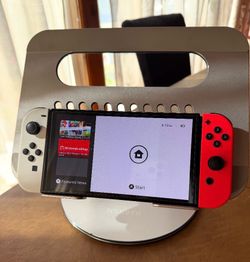 Nintendo switch OLED w red and white joy con