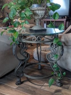 Glass top and iron base side table or entry table