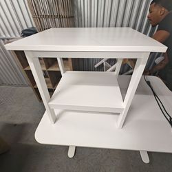 2 white coffee tables