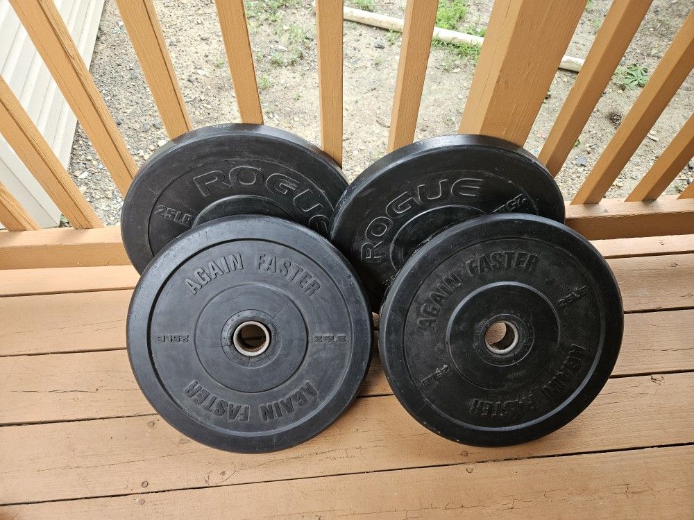 Four 25lbs Rubber Bumper Weights
