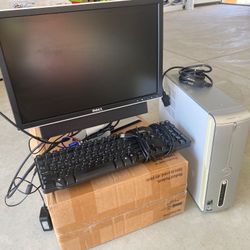 Dell Computer With Keyboard And Speakers Attached 