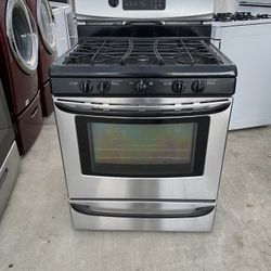  Whirlpool beautiful stainless steel gas stove in great working condition. All burners and the oven work perfectly. Looks like new, very clean and wel