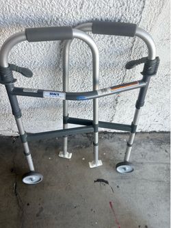 Adult folding walker  ( like new )