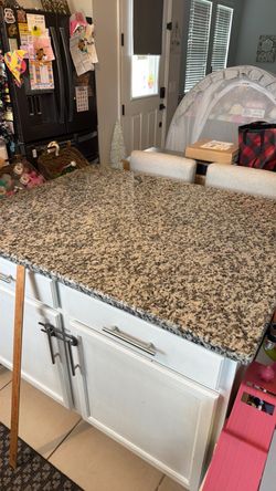 Kitchen Island with Beveled Granite Countertop