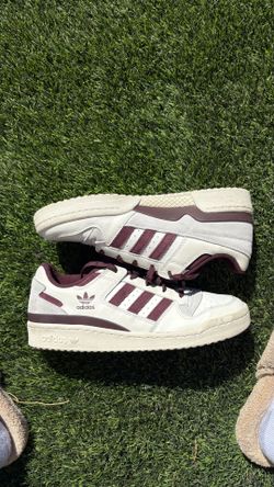 These are Adidas Forum Low CL sneakers in the Cloud White / Aurora Ruby colorway