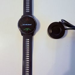 Garmin smartwatch Venu 2 with USB charger