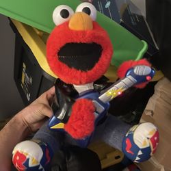 Elmo With Guitar Leather Jacket Moves And Plays 