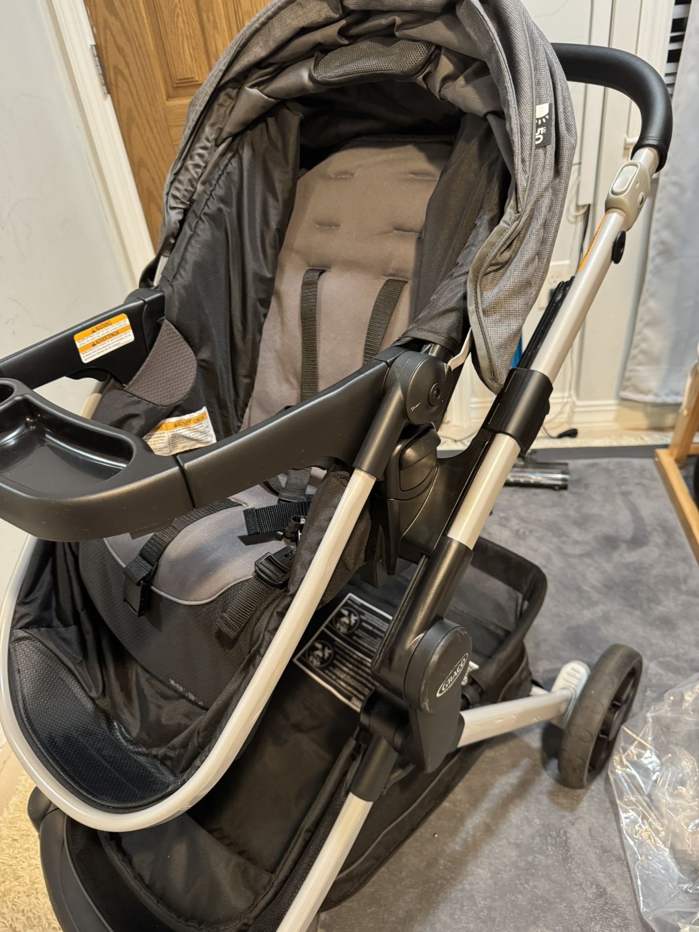 Graco Modes Nest Travel System with SnugRide 35 Lite Elite Infant Car Seat & Base – Gray