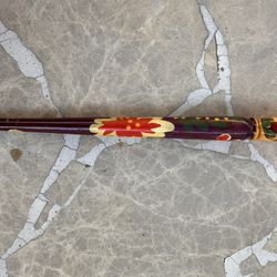 decorative wooden babushka stick, also commonly known as a Russian Matryoshka doll pen or penci.