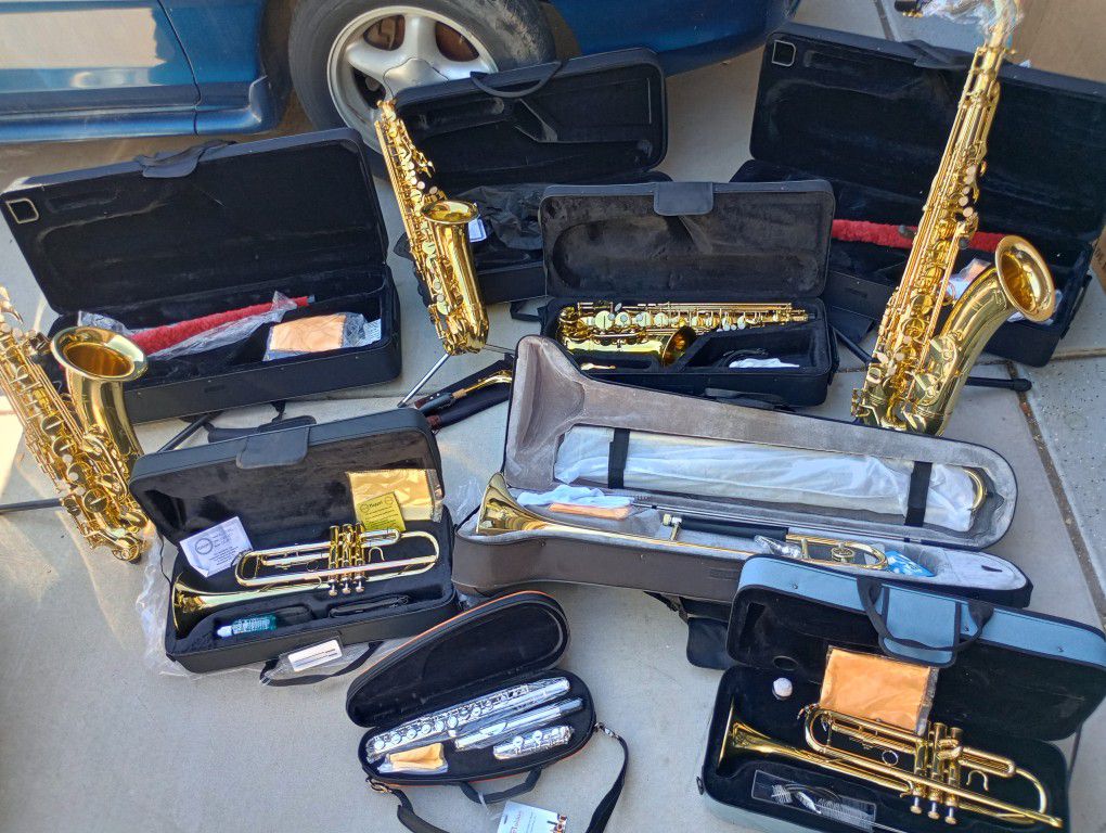 New Brass Instruments Tenor and Alto Saxophones, Trombone, Trumpets and Silver  Plated Flute
