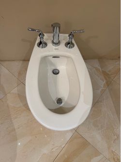 Toto Bidet Excellent Condition with Kohler chrome fixtures.