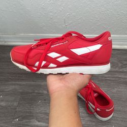 red and white reebok running shoes