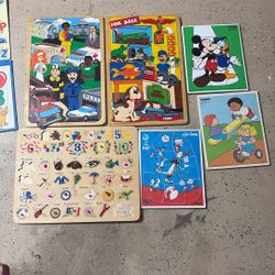 Vintage Puzzles Made Out Of Wood .